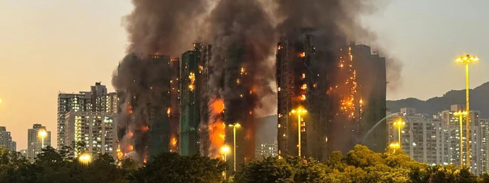 Fire Engulfs High-Rise Housing Estate In HK